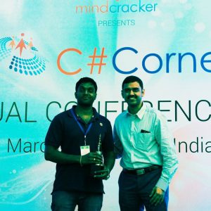 Receiving C# Corner MVP Award from SQL master Vinod Kumar M